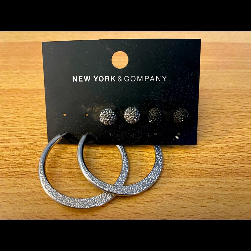 Three pair of New York & Company earrings.